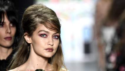WATCH: Vitalii Sediuk Lifts Gigi Hadid, Gets Elbowed