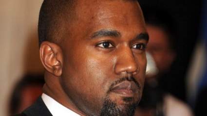 Kanye West Slams Head on Road Sign Ducking from Paparazzi [VIDEO]